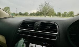 car ac blowing hot air