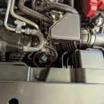 Example of a CVT transmission fluid dipstick in the engine bay. Not all CVT-equipped vehicles have a dipstick.