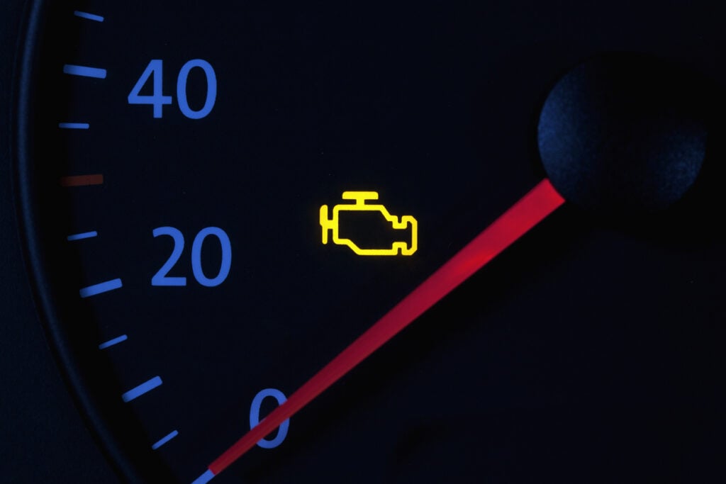 solid check engine light on a car dashboard