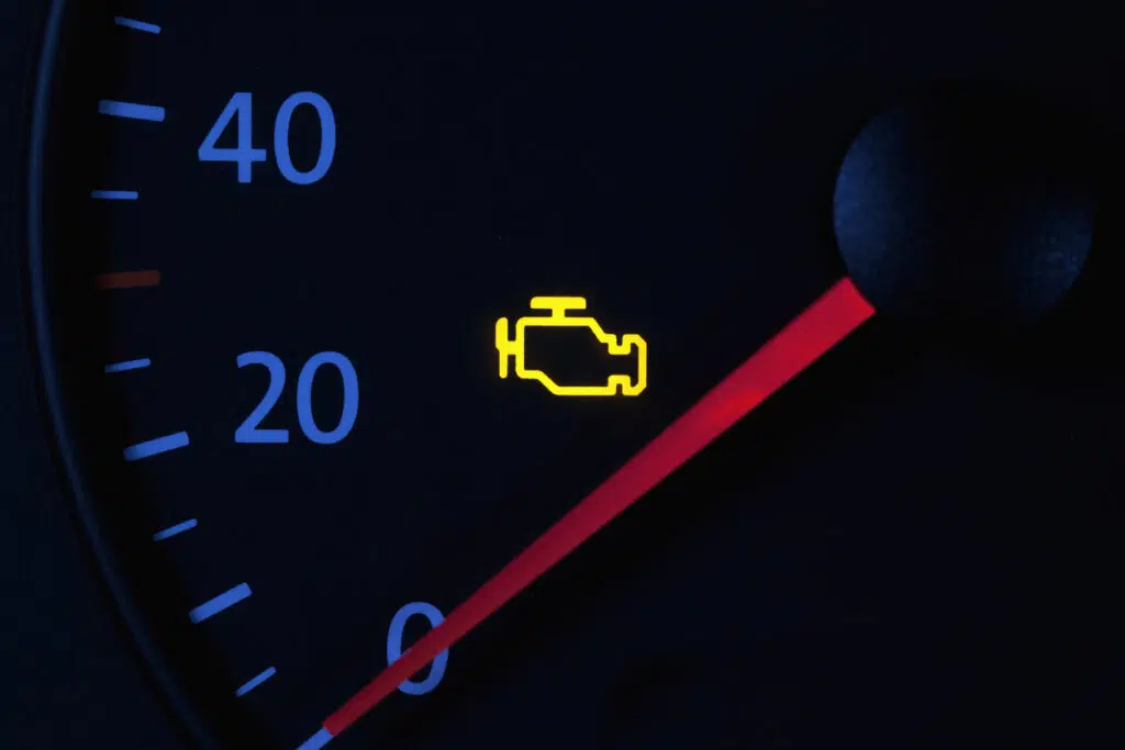 solid check engine light on a car dashboard