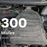 P0300 fault code guide featured image on a 1.0 TSI engine bay, usually a coil or spark plugs