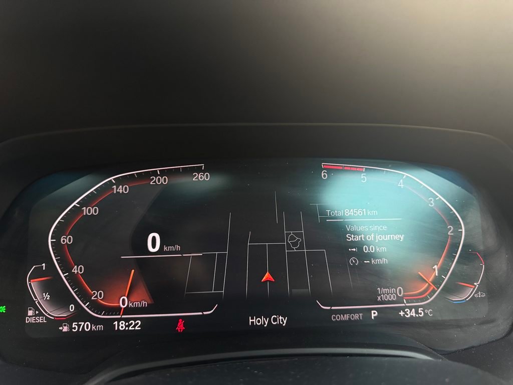 2020 BMW X5 instrument cluster in standard view before the OBDeleven M View Style Cluster app